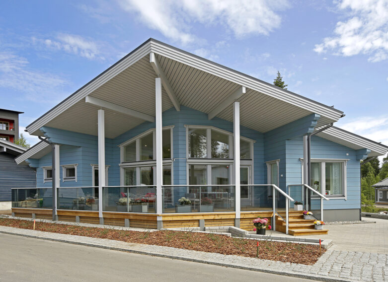The pale blue Nuuna is a striking sight, and the gabled roof rises impressively at the front of the building.