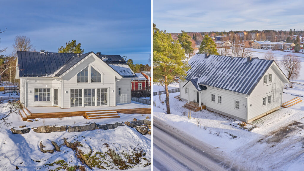 Ett vitt, traditionellt timmerhus med sadeltak. Mot vägen har huset små fönster, men mot floden vetter stora fönster.